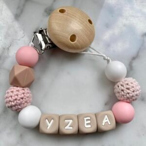 attache tétine yzea